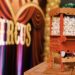 A popcorn trolley inside a theater with the sign "circus" in the background